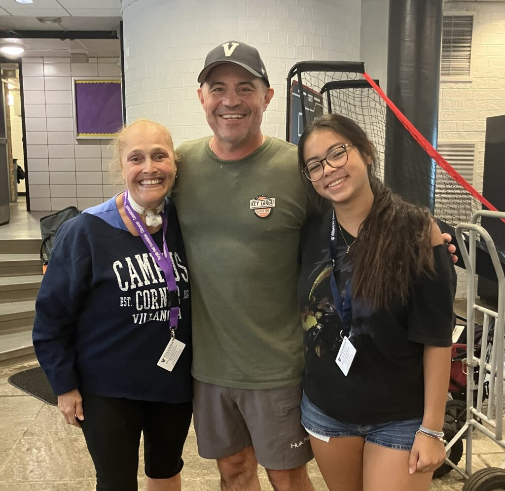 Martha & Lance Rougeux, founders of Purple Feet Foundation, LLC, with junior camp counselor, Elsie at the 2026 thinc Camp